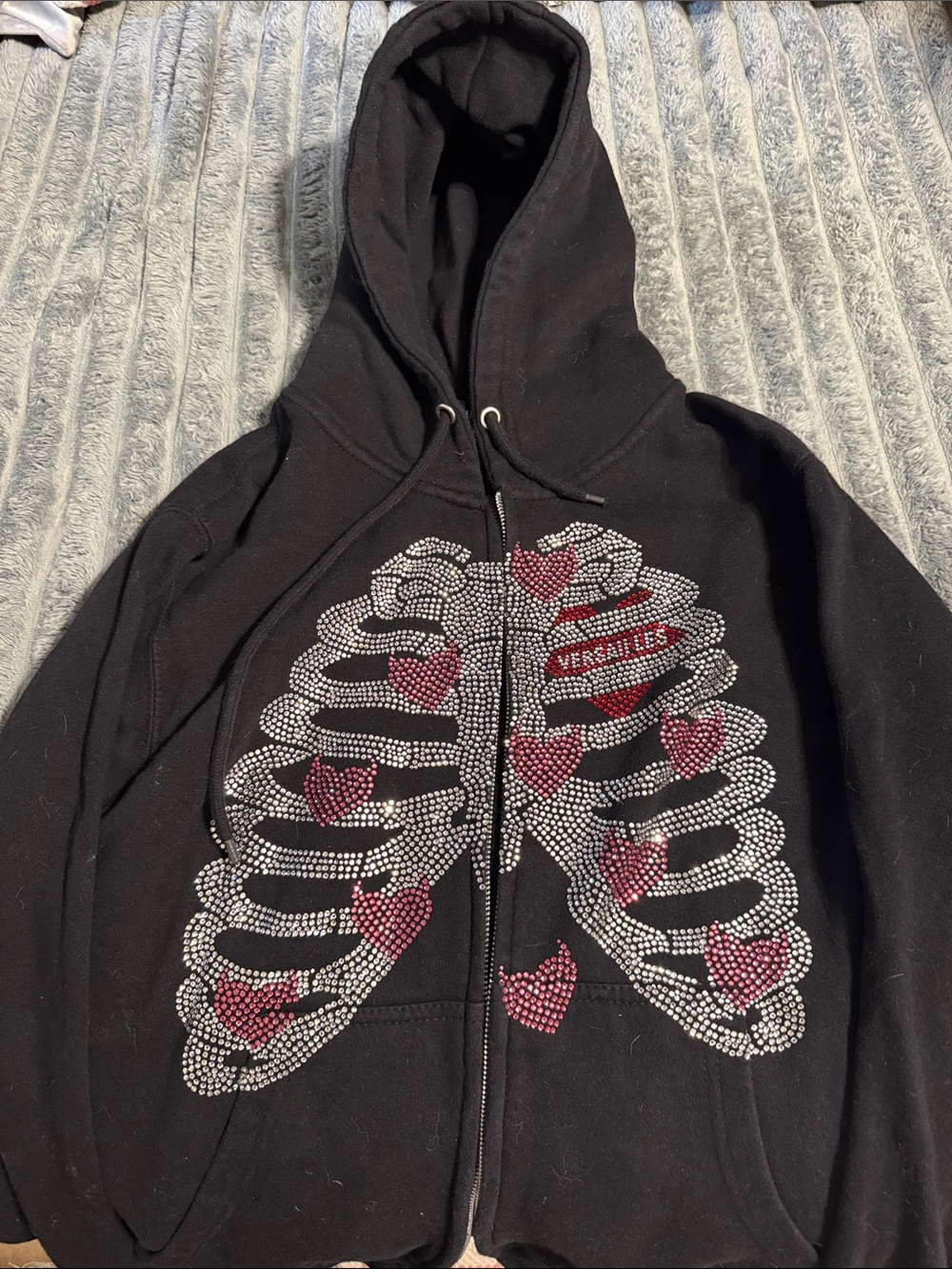Versatile Black Rhinestone Ribcage Zip Hoodie with Pink Heart Accents